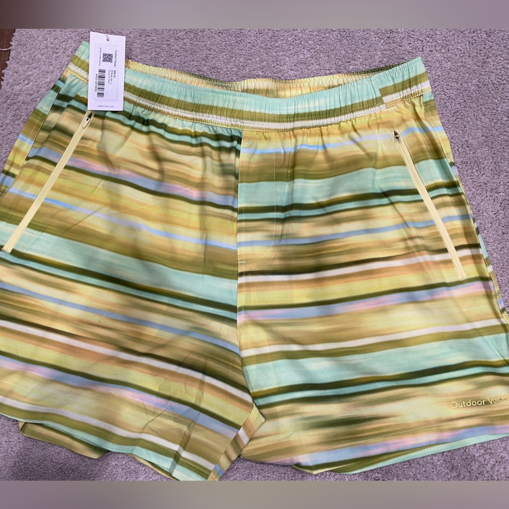 NWT Outdoor Voices Zephyr 5” shorts on Wildflower Haze. Built in shorts, pockets